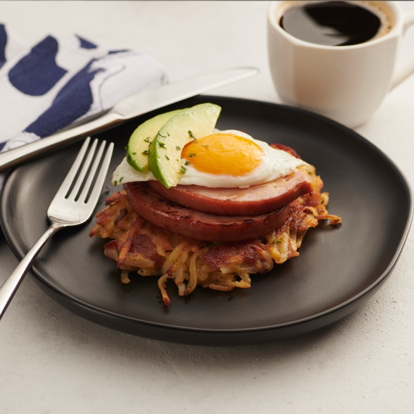 Bacon Potato Cakes with Ham Steak, Egg, and Sliced Avocado