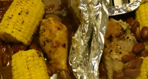 Foiled BBQ Chicken with Corn on the Cob and Pinto Beans