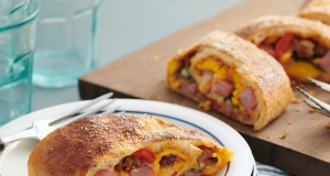 Ham and Sausage Breakfast Stromboli with Roasted Peppers and Spinach