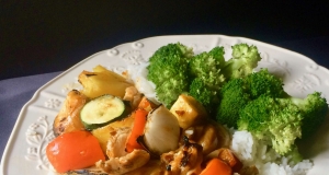 Grilled Orange Chicken Thigh Skewers with Pineapple and Vegetables