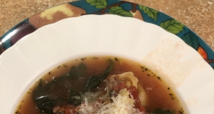 Garlicky Tortellini Soup With Sausage, Tomatoes, and Spinach