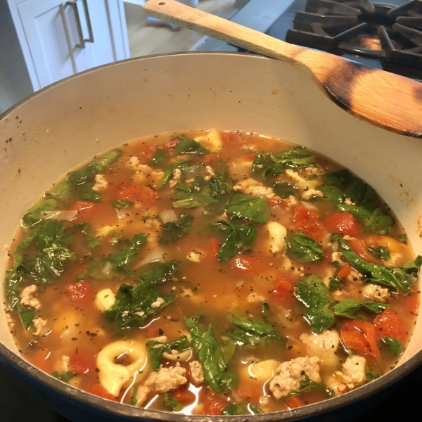 Garlicky Tortellini Soup With Sausage, Tomatoes, and Spinach