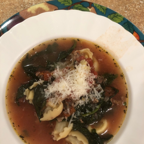 Garlicky Tortellini Soup With Sausage, Tomatoes, and Spinach