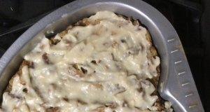 Rum Raisin Bread Pudding with Warm Vanilla Sauce