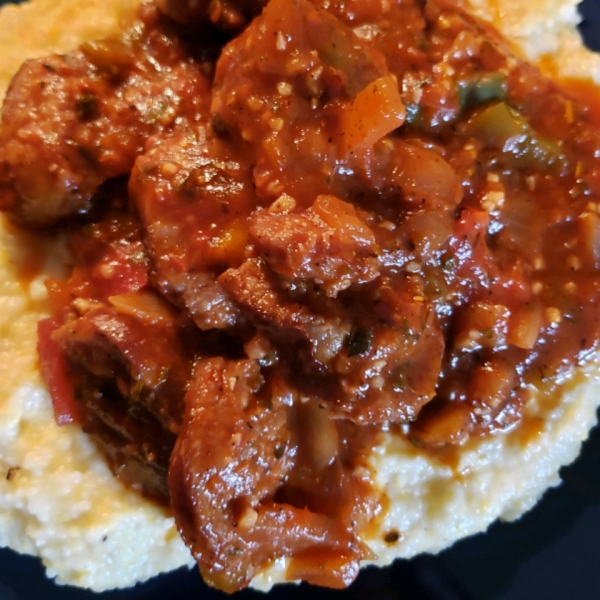 Sausage and Peppers over Creamy Parmesan Polenta