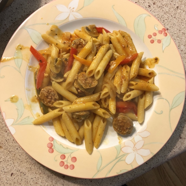 Sausage and Peppers over Creamy Parmesan Polenta