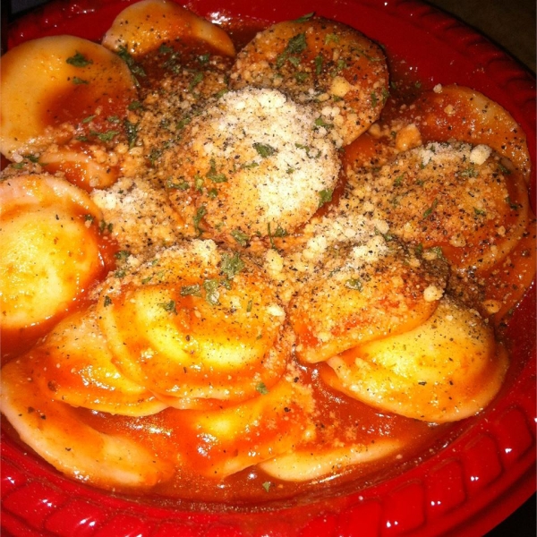 Cheese Ravioli with Fresh Tomato and Artichoke Sauce