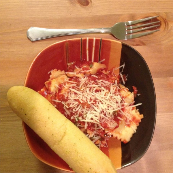 Cheese Ravioli with Fresh Tomato and Artichoke Sauce