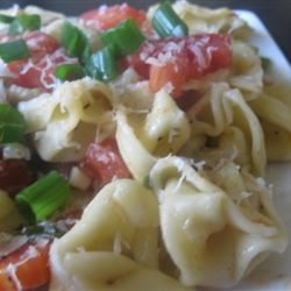 Cheese Ravioli with Fresh Tomato and Artichoke Sauce