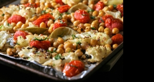 Easy Vegan Sheet Pan Roasted Cauliflower, Tomatoes, and Garbanzo Beans