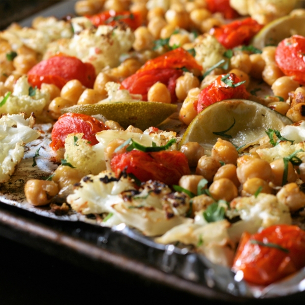 Easy Vegan Sheet Pan Roasted Cauliflower, Tomatoes, and Garbanzo Beans