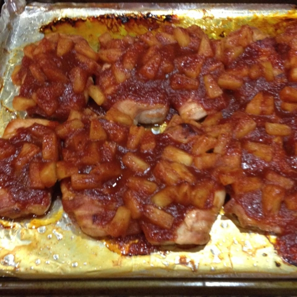 Bacon Wrapped Pork Chops in Zesty Sauce