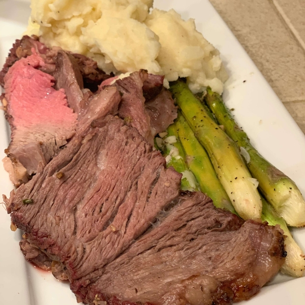 Boneless Garlic and Rosemary Rubbed Prime Rib with Red Wine Mushroom Sauce