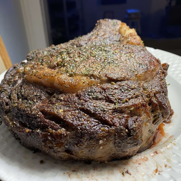 Boneless Garlic and Rosemary Rubbed Prime Rib with Red Wine Mushroom Sauce