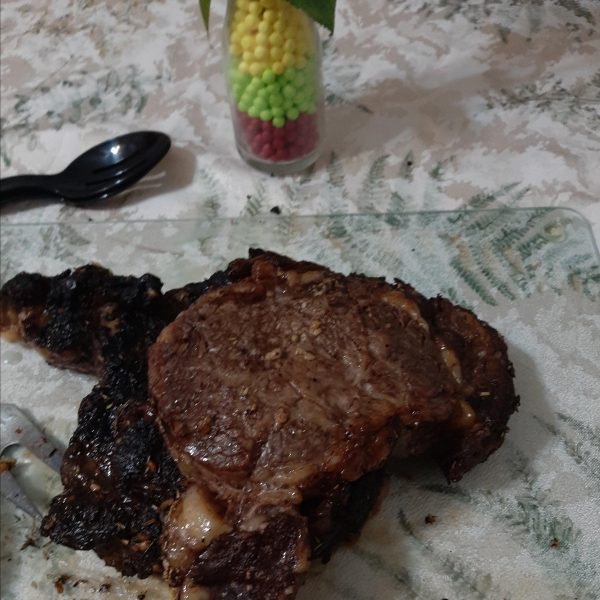 Boneless Garlic and Rosemary Rubbed Prime Rib with Red Wine Mushroom Sauce