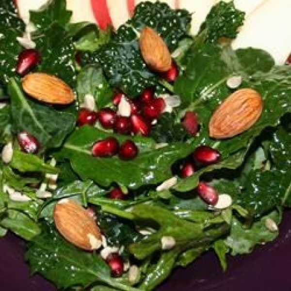 Kale Salad with Pomegranate, Sunflower Seeds and Sliced Almonds