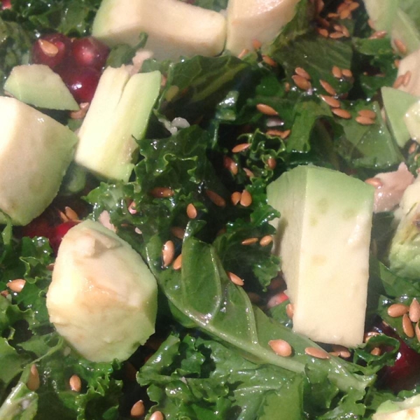 Kale Salad with Pomegranate, Sunflower Seeds and Sliced Almonds