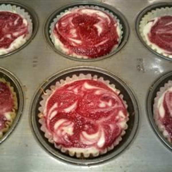 Mini Raspberry Swirl Cheesecakes