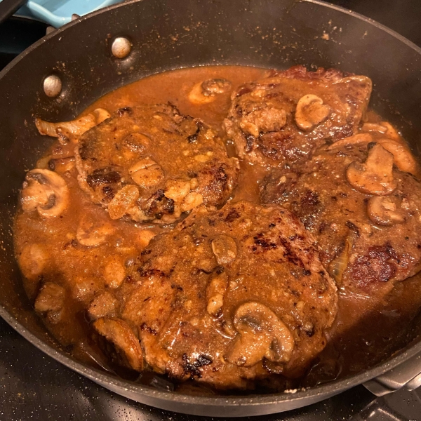 Smothered Pork Chops with Bourbon and Mushrooms