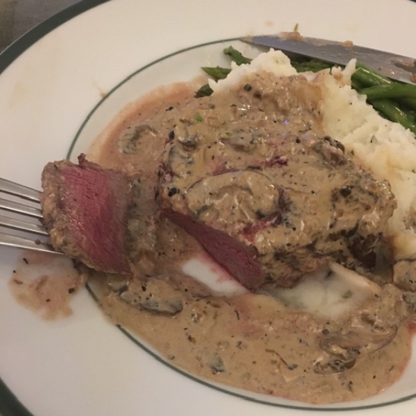 Crab-Stuffed Filet Mignon with Whiskey Peppercorn Sauce