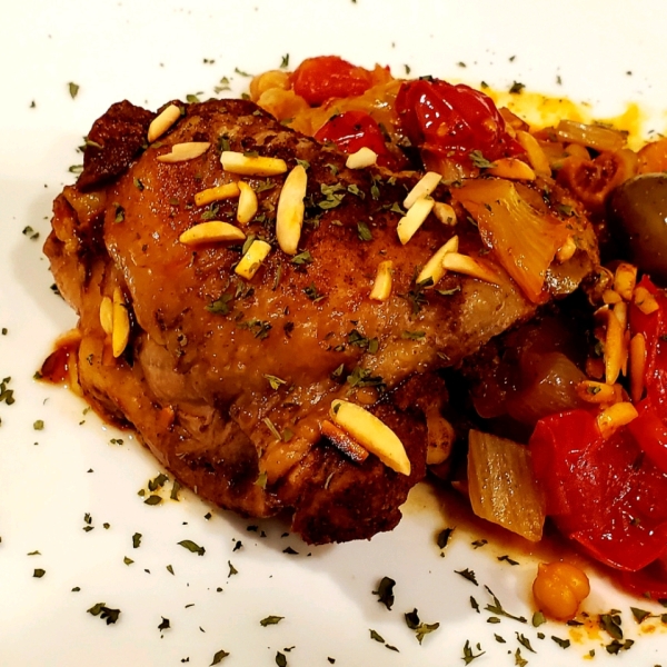 Moroccan Chicken Tagine with Preserved Lemons, Fennel, Olives, and Harissa