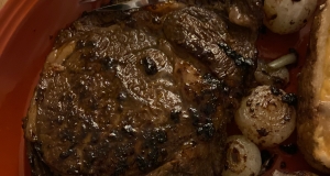 Pan-Roasted Ribeye with Caramelized Onions and White Truffle Butter