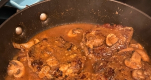 Smothered Pork Chops with Bourbon and Mushrooms