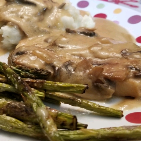 Smothered Pork Chops with Bourbon and Mushrooms