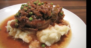 Slow Cooker Pork Chops with Caramelized Onions and Peas