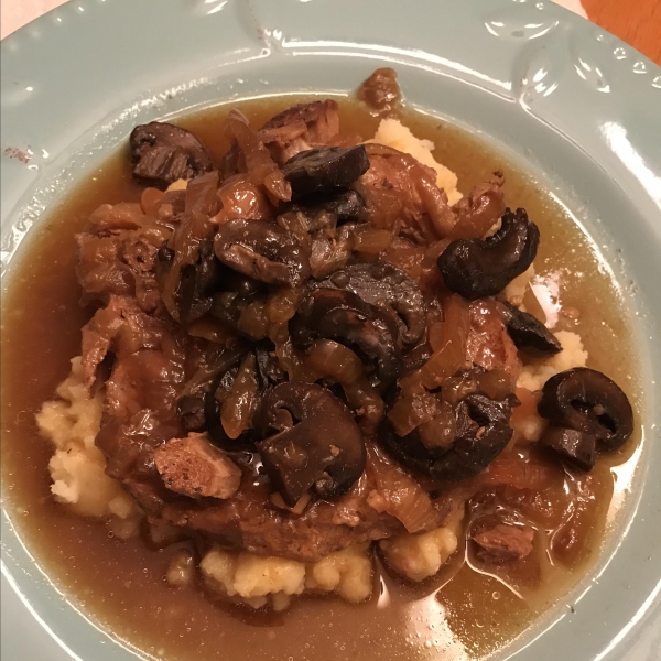 Slow Cooker Pork Chops with Caramelized Onions and Peas