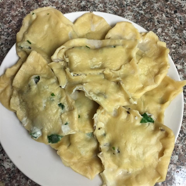 Mushroom and Spinach Ravioli with Chive Butter Sauce