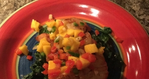 Scallops with Mango Salsa on Fresh Spinach