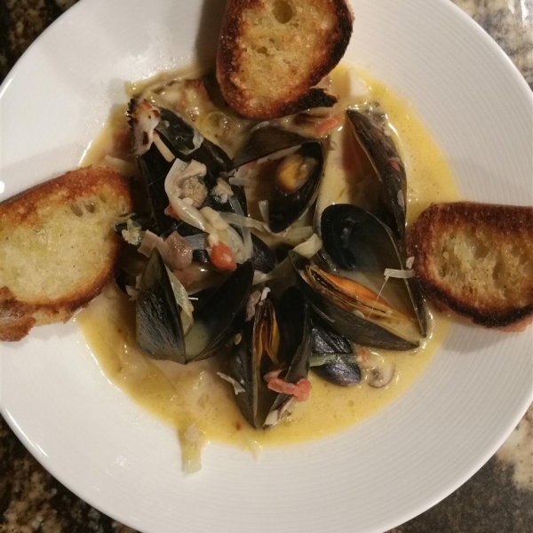 Steamed Mussels with Fennel, Tomatoes, Ouzo, and Cream