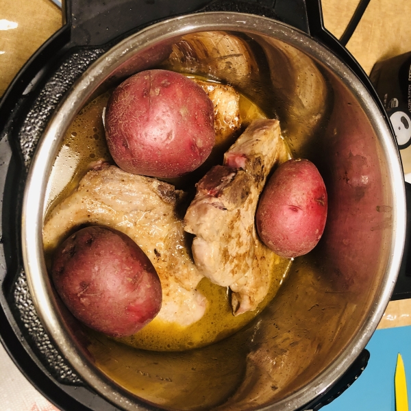 Pressure Cooker Bone-In Pork Chops, Baked Potatoes, and Carrots