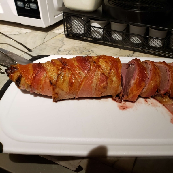 Bacon-Wrapped Venison Tenderloin with Garlic Cream Sauce