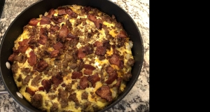 Cheesy Bacon-Sausage-Egg-Hash Brown Skillet