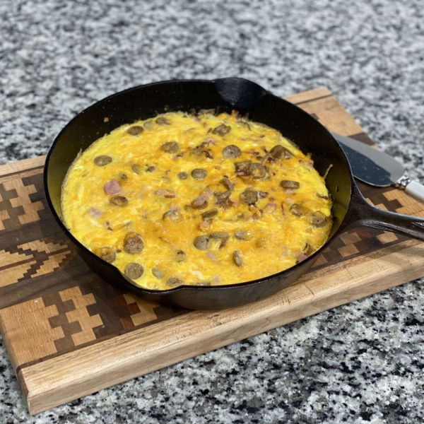 Cheesy Bacon-Sausage-Egg-Hash Brown Skillet