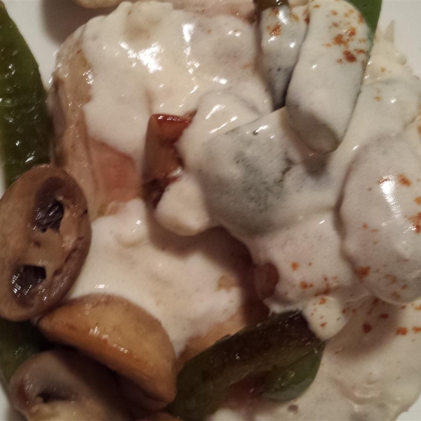 Nikki's Pork Chops with a Mushroom Cream Sauce over White Jasmine Rice