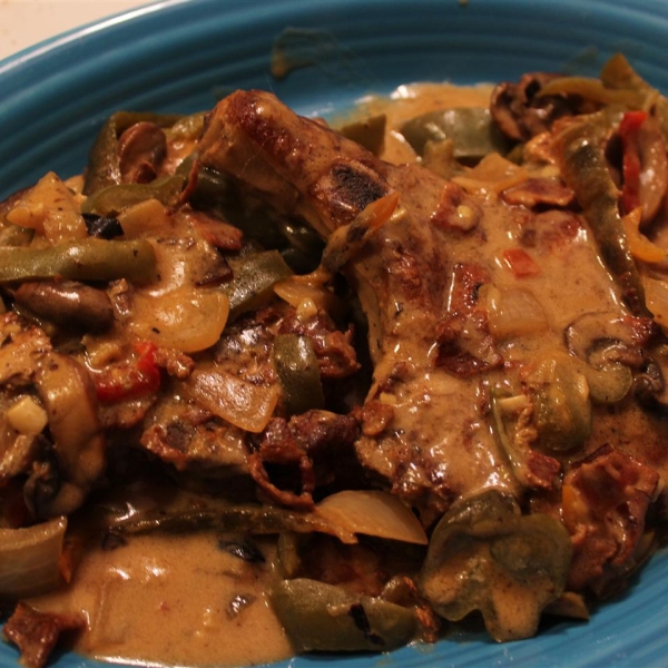 Nikki's Pork Chops with a Mushroom Cream Sauce over White Jasmine Rice