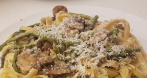 Fettuccine and Zoodles Topped with Chicken Sausage, Asparagus, and Mushrooms