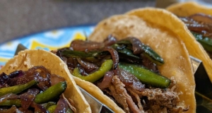 Instant Pot® Brisket Barbacoa with Poblano Peppers and Onions