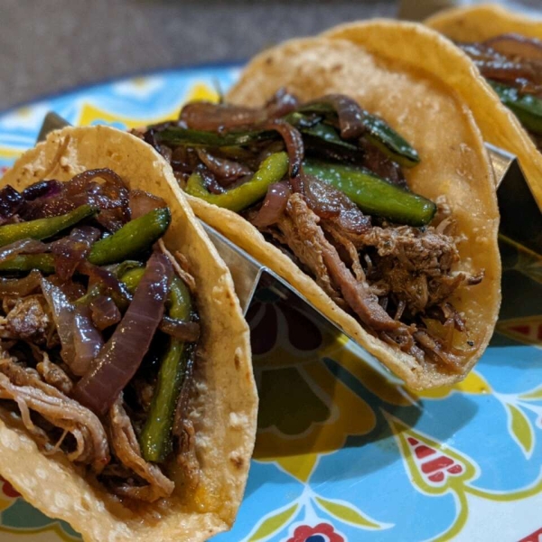 Instant Pot® Brisket Barbacoa with Poblano Peppers and Onions