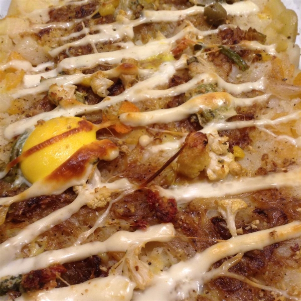 Mashed Potato, Rutabaga, And Parsnip Casserole With Caramelized Onions