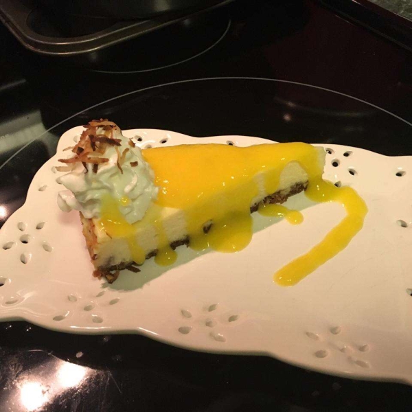 Coconut-Lime Cheesecake with Mango Coulis