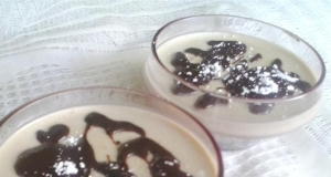 Costa Rican Coffee Panna Cotta with Bittersweet Chocolate-Rum Sauce