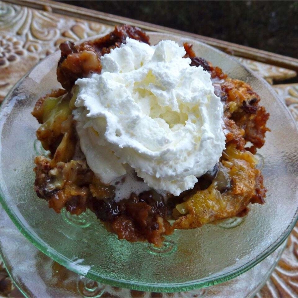 Rum Raisin Bread Pudding with Warm Vanilla Sauce