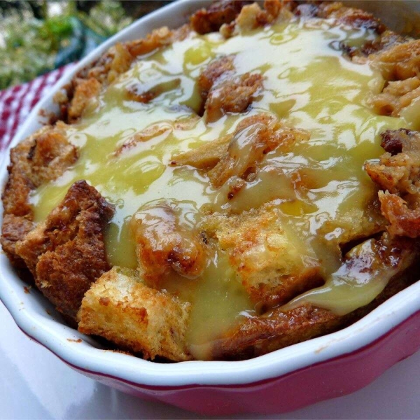 Rum Raisin Bread Pudding with Warm Vanilla Sauce