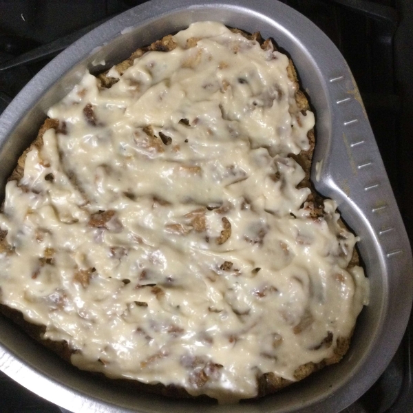 Rum Raisin Bread Pudding with Warm Vanilla Sauce