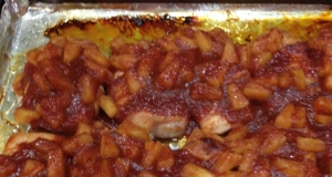 Bacon Wrapped Pork Chops in Zesty Sauce
