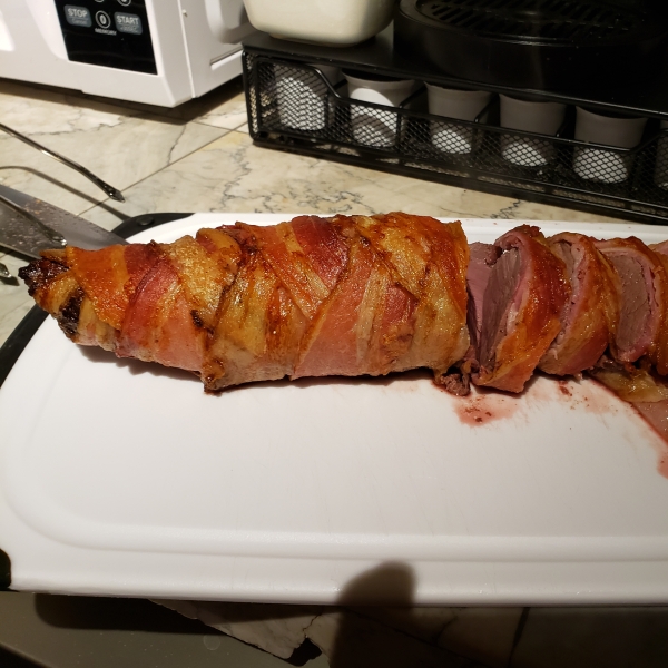Bacon-Wrapped Venison Tenderloin with Garlic Cream Sauce